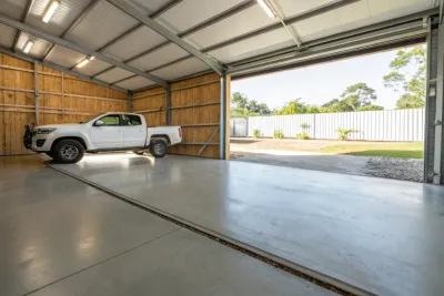 Clean finished concrete garage slab inside a Toowoomba garage